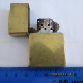 Zippo lighter marked solid brass, pin on flap replaced with piece of wire,  as per photo