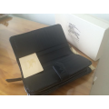 Burberry black-trimmed wallet - unused