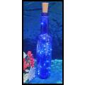 Blue Glass Bottle with Light