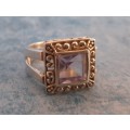 Elegant silver ring with a captivating pink Cushion stone