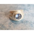 Elegant silver ring with a captivating Blue Round  stone
