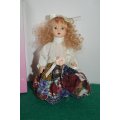 Limited edition full body minature porcelain vintage doll