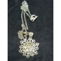 lOVELY LONG NECKLACE WITH PENDANT SILVER TONED FLOWER