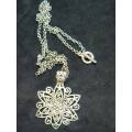 lOVELY LONG NECKLACE WITH PENDANT SILVER TONED FLOWER