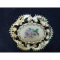 GOLD TONED BROOCH WITH FAUX PEARLS AND PETIT POINT FLOWER