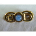 GOLD TONED BROOCH WITH SEMI PRECIOUS STONE STAMPED