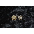 Very pretty ` faux pearl` and marcasite silver toned earrings and pendant set