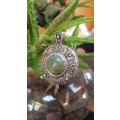 Absolutely gorgeous opal like pendant