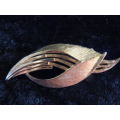GOLD TONED BROOCH