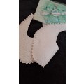 2 double layer vintage crotcheted cotton bibs and a pair of booties