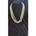 2x long single strand faux pearl necklaces
