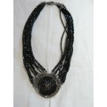 9 STRAND FASHION NECKLACE WITH PENDANT