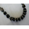 BLACK BEADED NECKLACE WITH BLING
