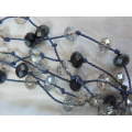 NECKLACE WITH GLASS BEADS AND VINTAGE GLOVES