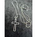 CROSS ON SILVER TONED CHAIN