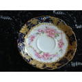 PORCELAIN STAMPED CUP AND SAUCER