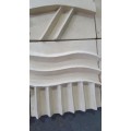 Unique plastered finish/cement type material. Wall hanging--great appeal,funky,modern!!