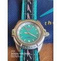 SUN CITY 1999 RARE SPEEDO WATCH IN IMACULATE CONDITION! PAPPERS AND BAG IN ORDER.
