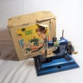 Vintage Casige toy sewing machine in box