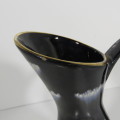 Vintage black porcelain pitcher