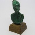 Malachite bust carving on wooden stand