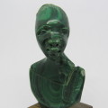 Malachite bust carving on wooden stand