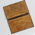 Vintage leather wallet with map of Africa