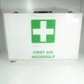 First Aid metal box with various items inside