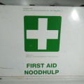 First Aid metal box with various items inside