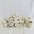 Lot of antique toothpaste and other holders and lids - 19 Pieces in total