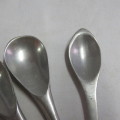 Set of 4 aluminium spoons