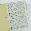 Pair of NRA service shooting score books