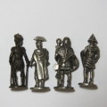Lot of 4 vintage small metal soldiers