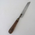 Unusual shaped carving knife