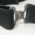 Black material tactical belt with baton holster