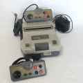 Vintage Hitex TV games console with 2 controllers - not tested