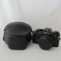 Nikon EM camera with Nikon lens series E 50 mm 1:1.8