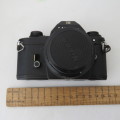 Nikon EM camera with Nikon lens series E 50 mm 1:1.8