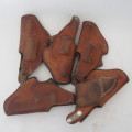 Lot of 10 leather holsters and straps for .32 and .38 revolvers