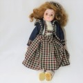 Porcelain doll with checked skirt and jean jacket - 40 cm High