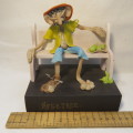 `Retired` novelty figurine