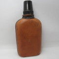 Vintage `Peine` glass hipflask with leather cladding