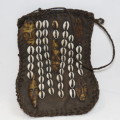 West African leather carry bag - Decorated with shells and bone masks