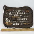 West African leather carry bag - Decorated with shells and bone masks