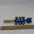 Vintage wooden kitten musical rattle with bells