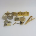 Lot of cufflinks and tie pins