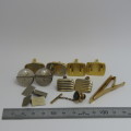 Lot of cufflinks and tie pins