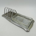 Vintage toast rack with glass butter dish