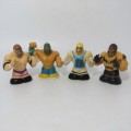 Set of 4 Wicked cool WWE wrestling Thumbpers figurines