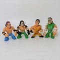 Lot of 4 WWE Rumblers figurines